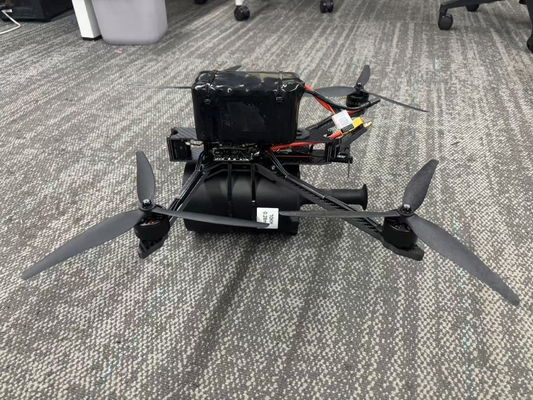 लंबी दूरी FPV फाइबर कोटिंग क्वाडकोप्टर ड्रोन रिमोट कंट्रोल 20 किमी/रोल 2.8 मिमी